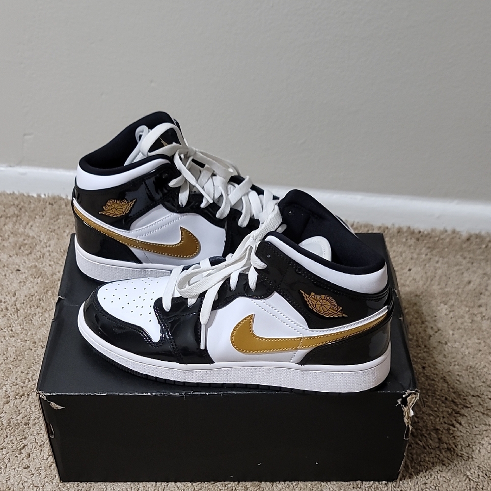 Jordan Black and Gold Sneakers Classic Design